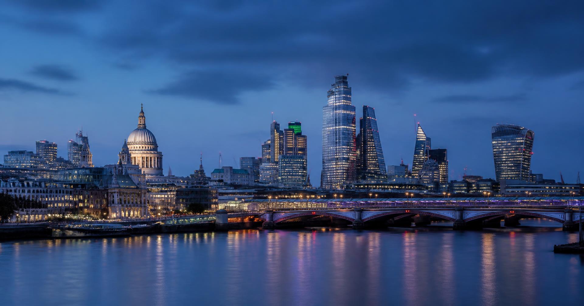 The City of London skyline and River Thames at dusk